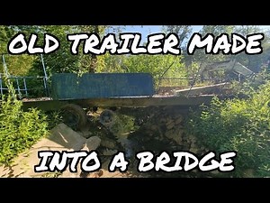 Old moblie home trailer turned into a creek bridge. #73