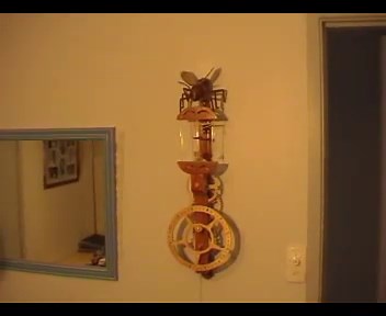 Flying Pendulum Wooden Clock