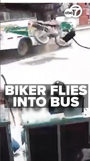 WILD CRASH CAUGHT ON CAMERA: BIKER ENDS UP INSIDE MOVING BUS
