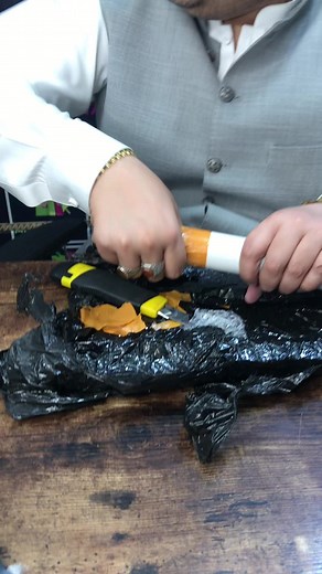 How to Cut a Plastic Bag Using a Utility Knife