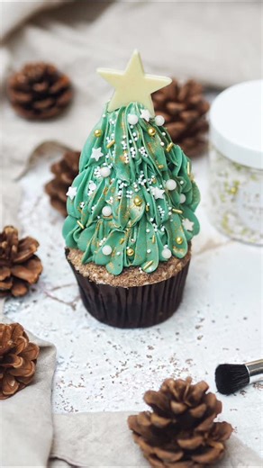 The Cake Decorating Company on Instagram: "The cutest Christmas Tree cupcake hack, using @colour.mill, sprinkles and a spritz of glitz ✨️🎄⁠ ⁠ All supplies available at The Cake Decorating Co."
