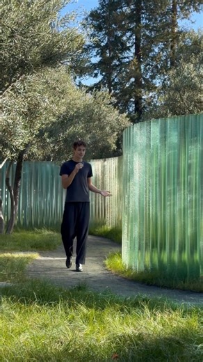 Ben on Instagram: "Developed over the course of multiple years and in collaboration with hundreds of people across various global communities, Katie Paterson and Zeller & Moye created ‘Mirage’ - a conceptual artwork at the intersection of art, design, and global environment. Commissioned by Apple for the public facing portion of Apple Park, ‘Mirage’ was completed in 2023. The work comprises over 400 glass columns, each exactly 6 feet and 7 inches tall, made with sand samples collected from 70 of