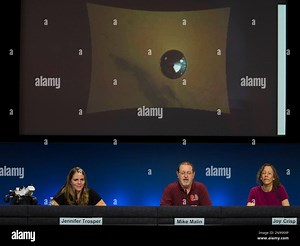 Jennifer Trosper, Mars Science Laboratory, MSL mission manager, JPL, left, Michael Malin, principal investigator, Mars Descent Imager, center, and Joy Crisp, MSL deputy project scientist, JPL take questions during a news briefing on the last data and imagery from Sol 1 at NASA's Jet Propulsion Laboratory in Pasadena, Calif., Monday, Aug. 6, 2012. NASA has released a low-resolution video of the Curiosity rover during the final few minutes of its descent to the Martian surface. An image shows the 
