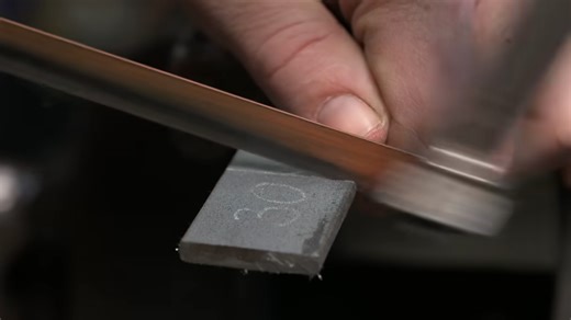 How to take a piece of steel and turn it into a scroll pendant