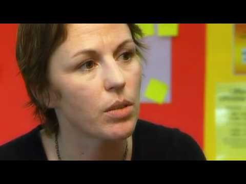 Teaching assistants engaging with secondary school students