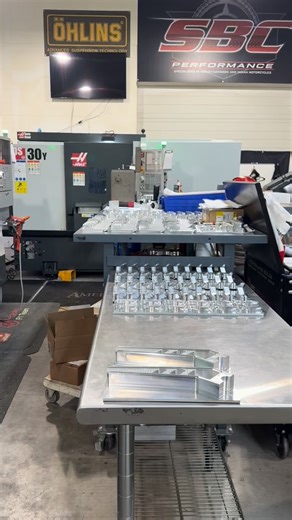 Back on the grind and turning material into straight-up problems. Machines screaming, bars bending, welds stacking—new parts dropping whether anyone’s ready or not. Nicole’s killing it in shipping, the shop’s wide open, and we’re leveling this whole game up. Hit the site and get your hands on real American-made parts. #sbcperformance #AmericanMade #PerformanceParts #MotorcycleParts #RealFabrication #NoCheapShit | SBC Performance