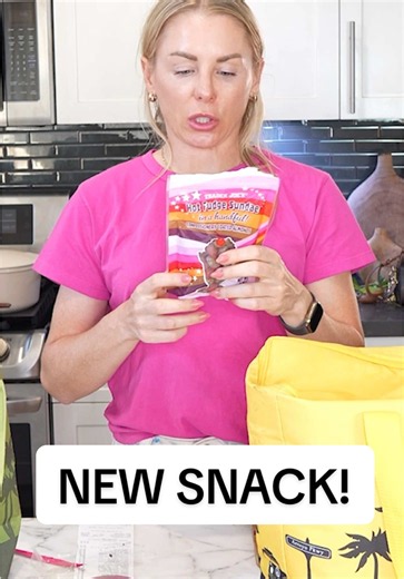 Trader Joe's somehow turned a hot fudge sundae into a snack... 🍒🍫 These new Hot Fudge Sundae In A Handful! almonds are such a fun treat. You get crunchy roasted almonds coated in vanilla ice cream and hot fudge flavors, plus cherry-coated almonds sprinkled throughout the bag as the