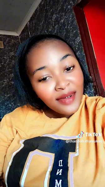 Distinctive Yellow Garment with Bold Lettering Design