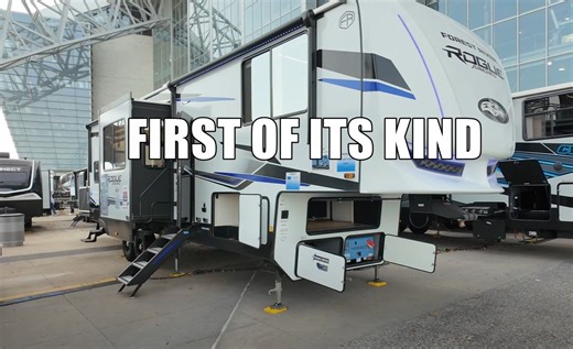 This Fifth-Wheel Toy Hauler RV Has a Transformable Garage and an Interior Slide