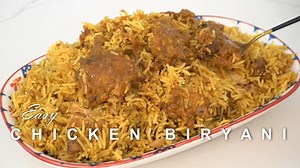 Easy CHICKEN BIRYANI How to make a quick and easy Chicken Biryani at home that is super yummy. Here's what you'll need: 1/3 cup oil (80ml) 3 medium onions (thinly sliced) 1 kg cleaned chicken thighs 3-4 medium tomatoes (sliced). 2 chilies (sliced) 2 tbsps garlic paste 2 tbsps ginger paste 5 tbsps or 60 grams Biryani Powder Mix (any brand will do) 1/2 cup yogurt(120g) 4 tbsps lemon juice(60ml) 1 tsp salt (5g) 1 cup water (250ml) FOR RICE PREP: 3 lites water 3 cup basmati rice (washed and drained)
