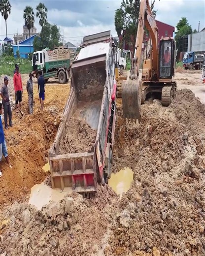 5K views · 55 reactions | Unreal scene! 5-ton dump truck crashes into the water—Dozer and Excavator rush in to save it! | Excavator Bulldozer | Facebook