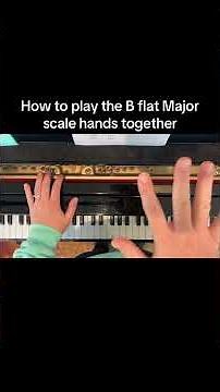 How to play the B flat Major scale hands together in 2 octaves.