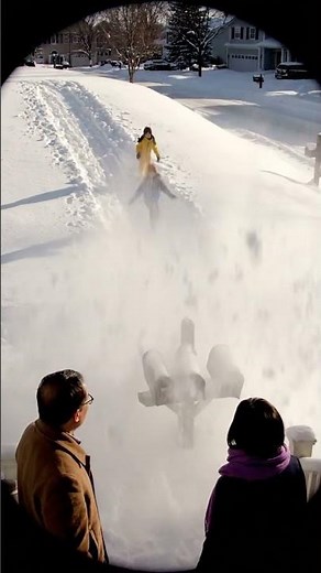 Giant Snowball Avalanche A wide-angle security camera view from a porch. K