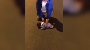 Mother charged after video of infant crawling through street goes viral
