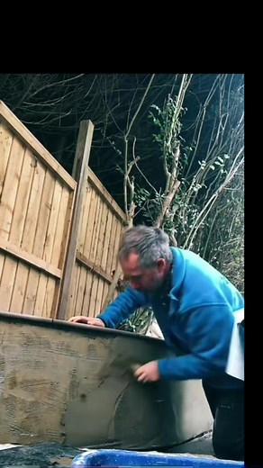 Applying Finish Coat on Concrete Block Render Wall