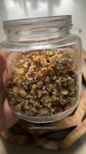 Megha | Healthy Recipes | Mindful Parenting on Instagram: "One spoon, endless benefits! 🌟 It's a powerhouse of brain-boosting nuts, energy-packed seeds, and immunity-strengthening honey that keeps your kids sharp, active, and ready to conquer the day. The best part? It’s homemade, preservative-free, and filled with love. A spoonful of this mix every morning keeps the whole family energised. Here's how you can make it👇 Ingredients: * Almonds: 1/2 cup * Cashews: 1/2 cup * Walnuts: 1/2 cup * Pist
