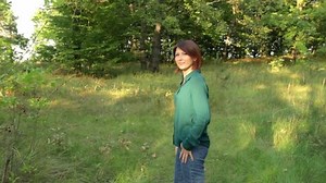 clip-1036375046-young-woman-walks-forest-girl-has-stroll