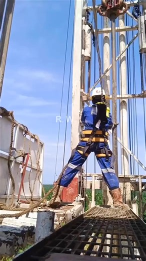 Derrick Man Pull Out Drilling Pipes | Oilfield Industry