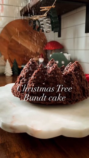 Lindsey Noorda 📍SLC, Utah on Instagram: "I found this Christmas tree Bundt cake pan on Amazon, and it’s officially my favorite holiday baking pan! It creates these detailed, tree-shaped cake that looks like you spent hours on it—when all you did was bake and flip! They had a few designs too! #christmasbaking #bakingchristmascake #christmascake #amazonfinds"