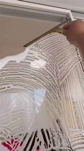 Cleaning glass windows effectively using a professional squeegee and soap