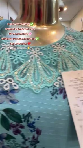 Stylish Dora Fabric Eid Collection Three-Piece Suits