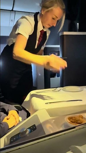 British airways First class getting ready for in flight meal.