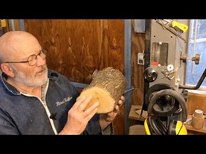 Richard Raffan cutting a split firewood log into woodturning blanks