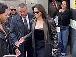 Selena Gomez takes photos with fans outside TIME 100 Summit in black PVC dress