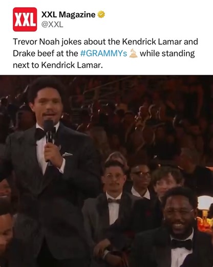 Trevor Noah jokes about the Kendrick Lamar and Drake beef at the Grammys while standing next to Kendrick Lamar. | XXL Magazine