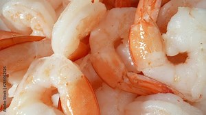 Boiled shrimp: simple, delicious. Cooked in boiling water for tender, flavorful result. Preserves natural sweetness, delicate texture, with a hint of briny goodness. Seafood background. 4K HDR.