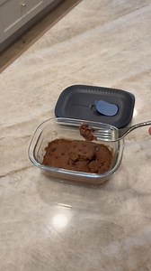 Craving something sweet but trying to stick to your healthy resolutions? Try this easy microwave chocolate cake that's ready in just 60 seconds! It's the perfect size to satisfy your sweet tooth without derailing your goals. 3 tbsp all-purpose flour 1 tbsp sifted cocoa powder 1 tbsp sugar 1/4 tsp baking powder 1/8 tsp salt 3 tbsp milk 1 tsp melted coconut oil or vegetable oil 1/4 tsp vanilla extract 1-2 tbsp semi-sweet chocolate chips 1. Mix all the dry ingredients in a microwave-safe container,