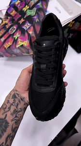 4.5K reactions · 92 shares | All-black mesh design with subtle logo pattern. Comfort meets sleek, modern style. Lightweight, breathable, and bold. ✅Perfect for daily wear with a touch of luxury. | Fascilove | Facebook