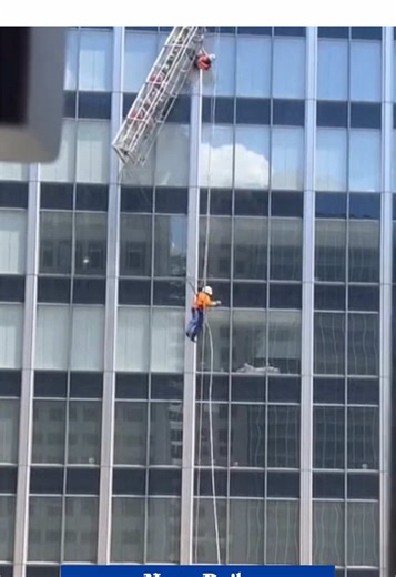 On Sunday, January 18, A suspended window-cleaning platform malfunctioned at a high-rise building, causing the equipment to tilt sideways while two workers were operating at height, according to reports. The men were secured by safety harnesses, which prevented them from falling as the platform became unstable. Emergency crews responded to the scene and assisted in safely lowering the workers to the ground. Officials are reviewing the cause of the malfunction and examining whether the equipment 