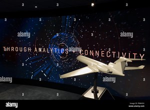 A model of a generic aircraft and the images from a video presentation in the exhibition chalet of United Technologies, at the Farnborough Airshow, on 16th July 2018, in Farnborough, England. United Technologies are the parent company to  Otis,, UTC Climate, Controls & Security, Pratt ＆ Whitney and UTC Stock Photo - Alamy