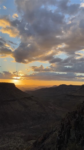 Surreal views from on top of Grootberg mountain. Damaraland's iconic flat top mountains, a little dust and clouds make for one memorable sunset! | Travel Namibia