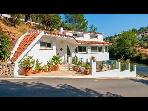 This Cozy Mediterranean Hillside Home Overlooks A Quiet Flowing River