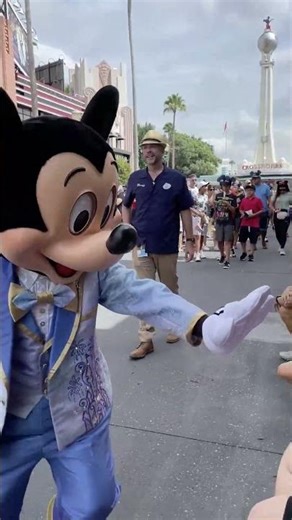 Precious Moments meeting Mickey for the first time.