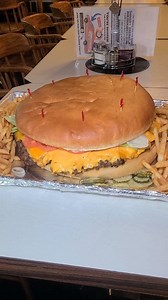 The Party Burger at Stuffy's II Restaurant in Longview, Washington is the stuff of legends! It begins with a 5 pound beef patty and loads of fries on the side. Tag a friend or 3 who could help you finish it! #burgers #foodies #bigback #trysomethingnew #carbs #FoodieFavorites #runnerslife #supportlocal #eatingchallenge #foodchallenge #cheeseburger #longview #Washington #travels #GainsOnGains #cateringlife | Freak Eating