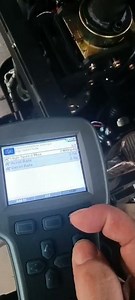 how to use the curtis handheld unit to adjust electruc pallet truck