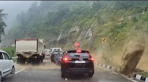 Video shows rock crush cars in deadly India landslide