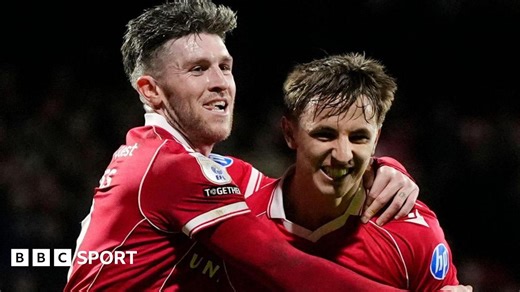 Wrexham 2-1 Portsmouth: Red Dragons bolster play-off hopes with hard-fought win