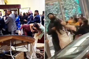 Savage wedding brawl sees guests batter each other, smash through tables and knock over the cake in Canada
