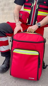 Stay prepared for any emergency with the EMS PARAMEDIC’S BACKPACK Designed for paramedics and rescue professionals, this durable and highly functional backpack ensures you can carry essential first aid equipment efficiently in critical situations. • Resilient material: Made from tough 600D polyester, built for demanding environments. • High visibility: Bright red design with yellow reflective stripes for enhanced safety in low-light conditions. • Modular system: Side straps allow secure attachme