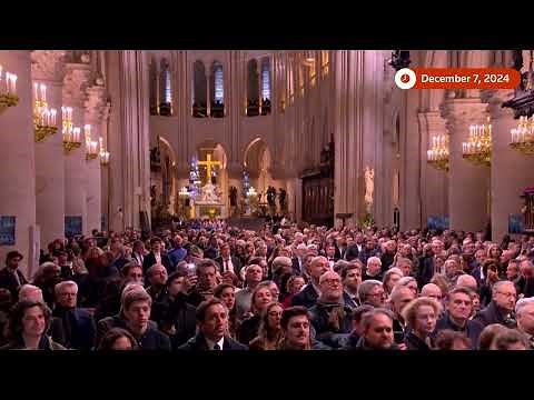 Bells ring through Paris as Notre-Dame re-opens its doors | REUTERS