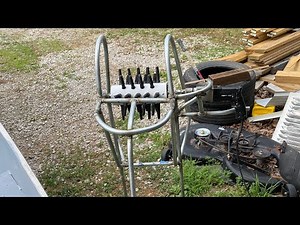 Homemade chicken plucker using a drill motor.