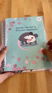 Spooky and Cherry Possum Reusable Sticker Books are restocked! Not MD and LG sizes are back in the shop so you can get your favorite cover designs now. #possummemes #reusablestickerbook #stickerbook #stickershop #scrapbooking | Geoffrey Siu