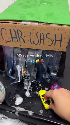 🚗💦CAR WASH STATION! Both my kiddos absolutely loved this one! AND setup was minimal! 🫶🏻 ➡️Follow @lovebloomlearn for more easy play ideas! 🧚‍♀️ To recreate this activity, make a car wash station using a box and cutting strips from a Ziploc or garbage bag. Glue/tape the strips from the inside and add a “car wash” sign. That’s really it! We put a bucket of soap and water with sponges and cars! It was a HUGE hit! ♥️ 👶🏼👶🏽👶🏾Activity is recommended for toddlers . An adult should supervise a