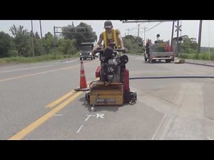 Groove-inlay to recess 3M pavement marking RXR Railroad legends and symbols
