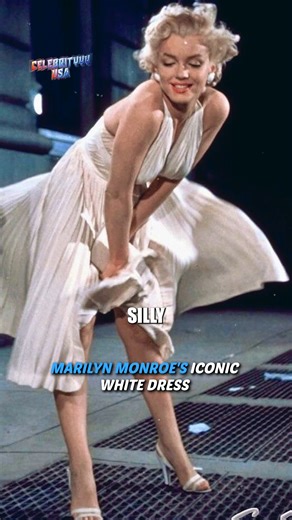 Marilyn Monroe's Iconic White Dress Marilyn Monroe’s iconic white dress from The Seven Year Itch remains a symbol of Hollywood glamour. Designed by William Travilla, the ivory halter dress became legendary after the famous subway scene. A blend of sensuality and elegance, it epitomizes Monroe’s legacy and enduring influence on fashion and cinema. The dress continues to inspire tributes and remains a cultural treasure. #MarilynMonroe #TheSevenYearItch #IconicFashion #HollywoodGlamour #TimelessSty