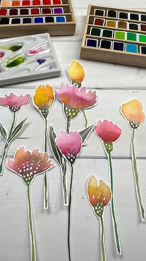 Karen Elaine on Instagram: "I am soothing my soul by creating colorful imaginary watercolor wildflowers inspired by @tiffanysimplysharpe using my newest set of gorgeous watercolors by @holbeinartistmaterials These watercolors are smooth, highly pigmented and activate quickly in water. The 48 color set even includes my beloved Opera pink. 🩷 Instead of the traditional tin, the colors, brush and porcelain mixing tray are packed in a beautiful Japanese lacquer box. I wrap my set in a furoshiki clot